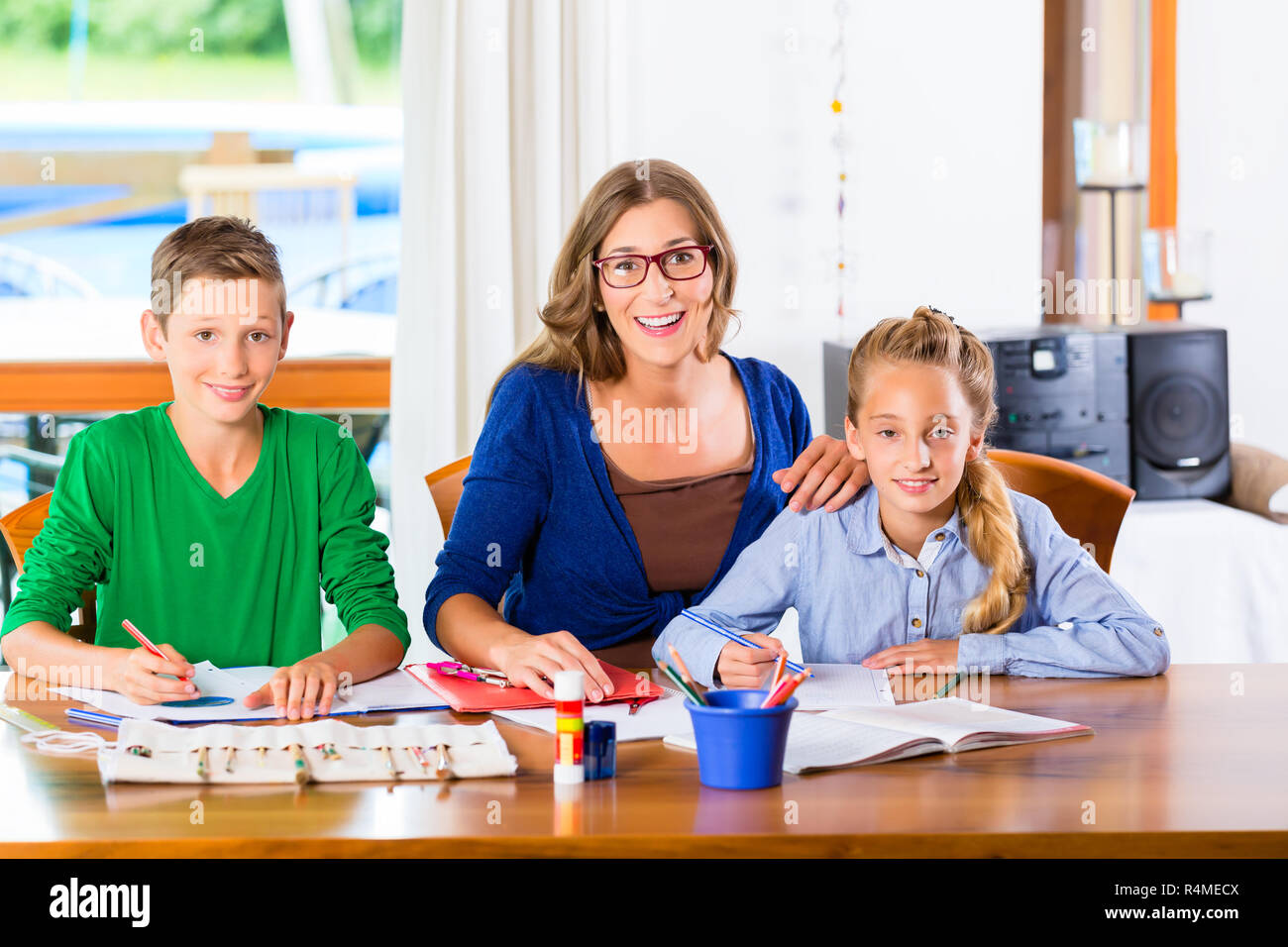 Private teacher giving lessons at home Stock Photo