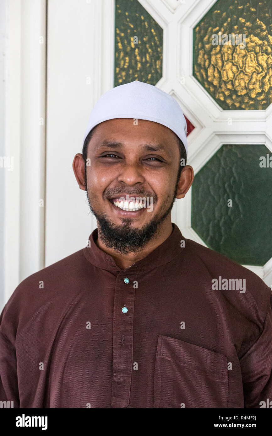 Young Malaysian Muslim Man, Ubudiah Mosque, Kuala Kangsar, Malaysia. Stock Photo