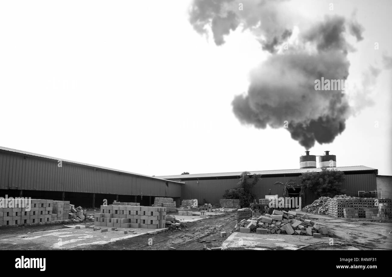 Cement Brick with factory exterior building, entrance factory. black