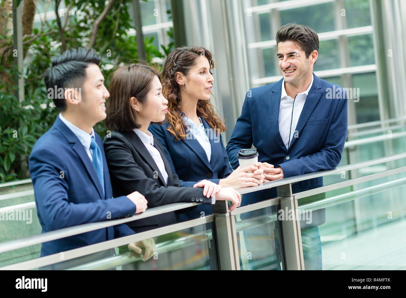 Business people discuss together Stock Photo