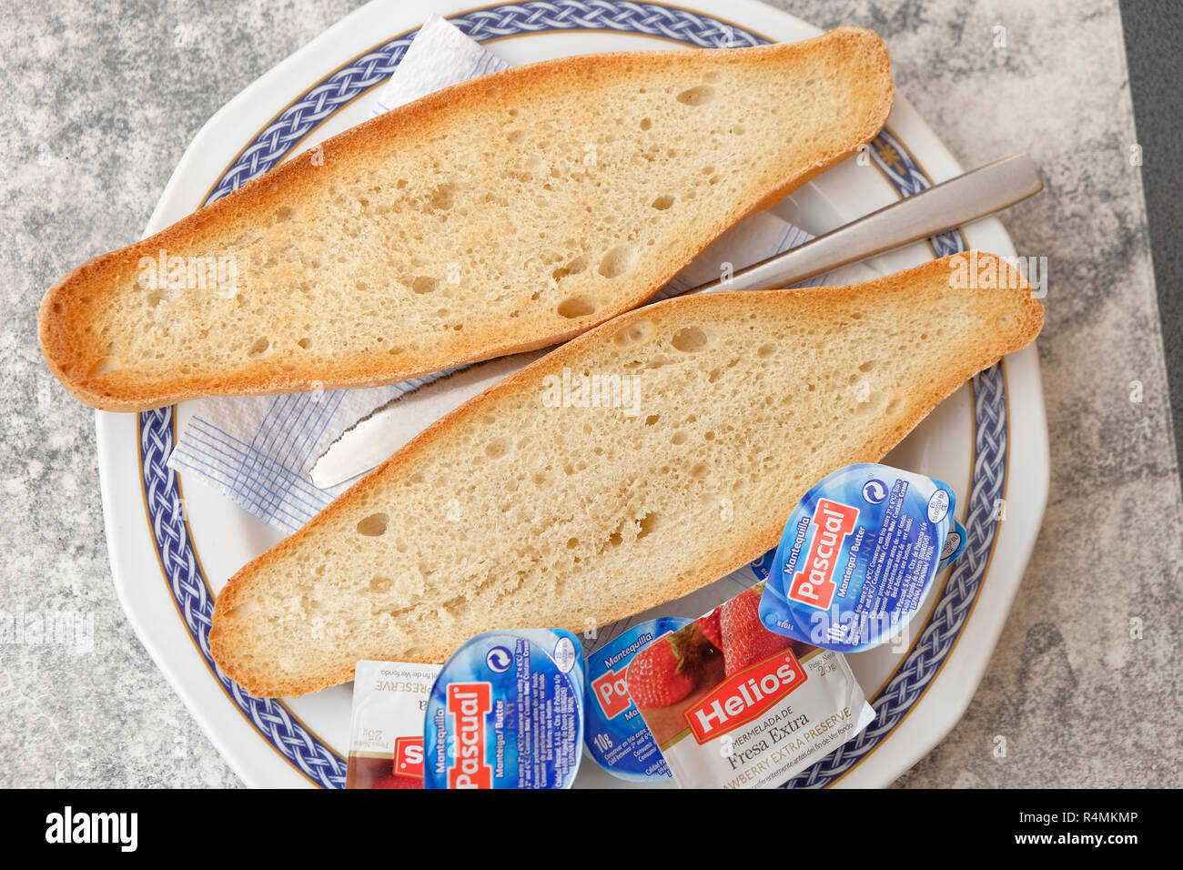 Tostadas, toast, traditional spanish toast with butter and strawberry