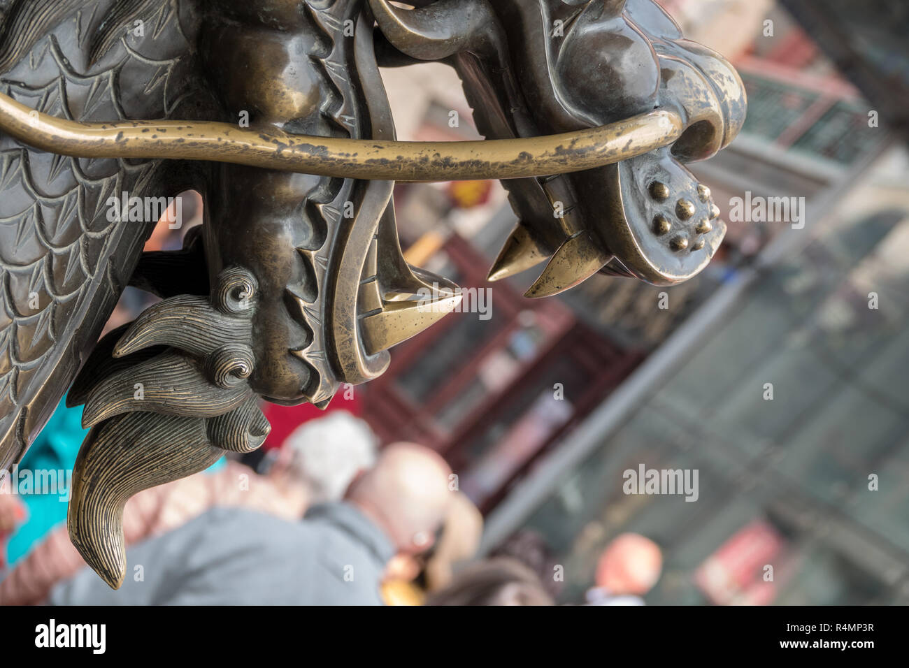 Rubbing head of statue brings good luck in Tianjin Stock Photo