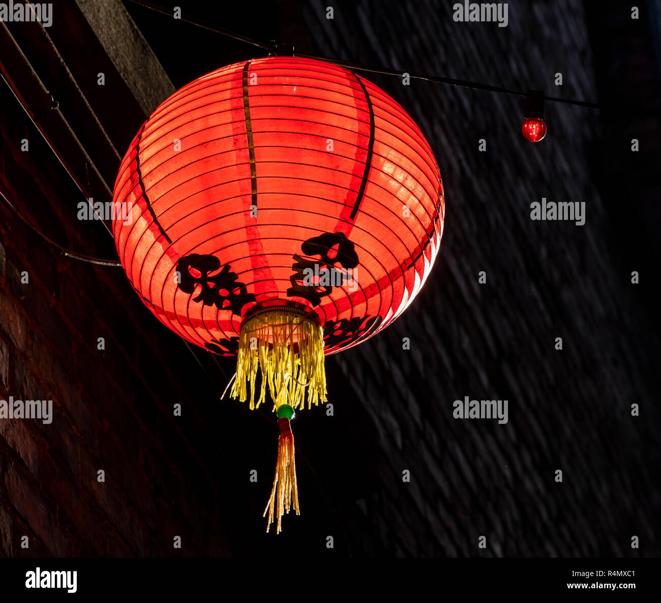 Paper lantern hanging in Fan Tan Alley in Chinatown in Victoria, British Columbia, Canada. Stock Photo