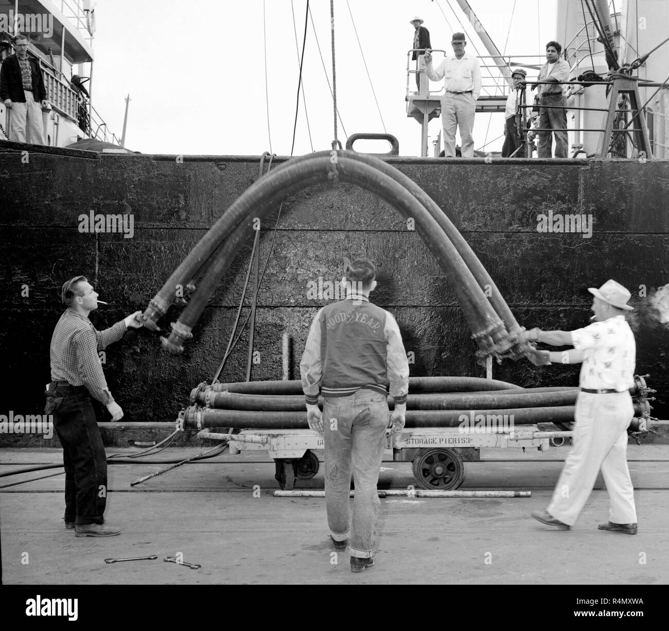 A ship is unloaded at the Port of Los Angeles in California, ca. 1955. Stock Photo
