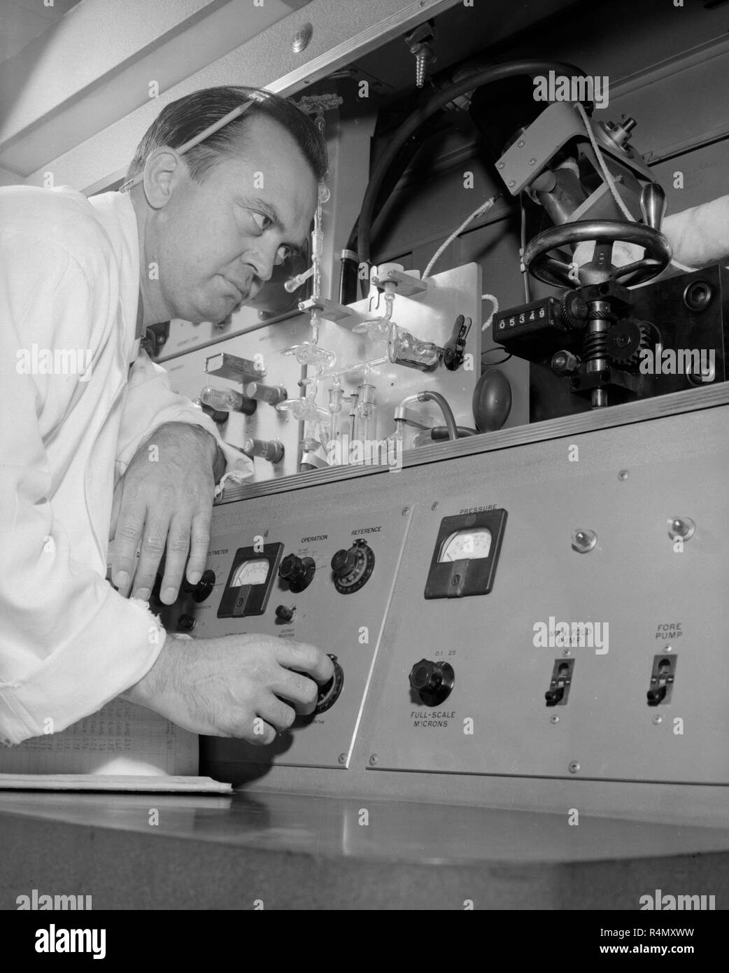A technician work at an American Cancer Society Research Center at UCLA in Southern California, ca. 1959. Stock Photo