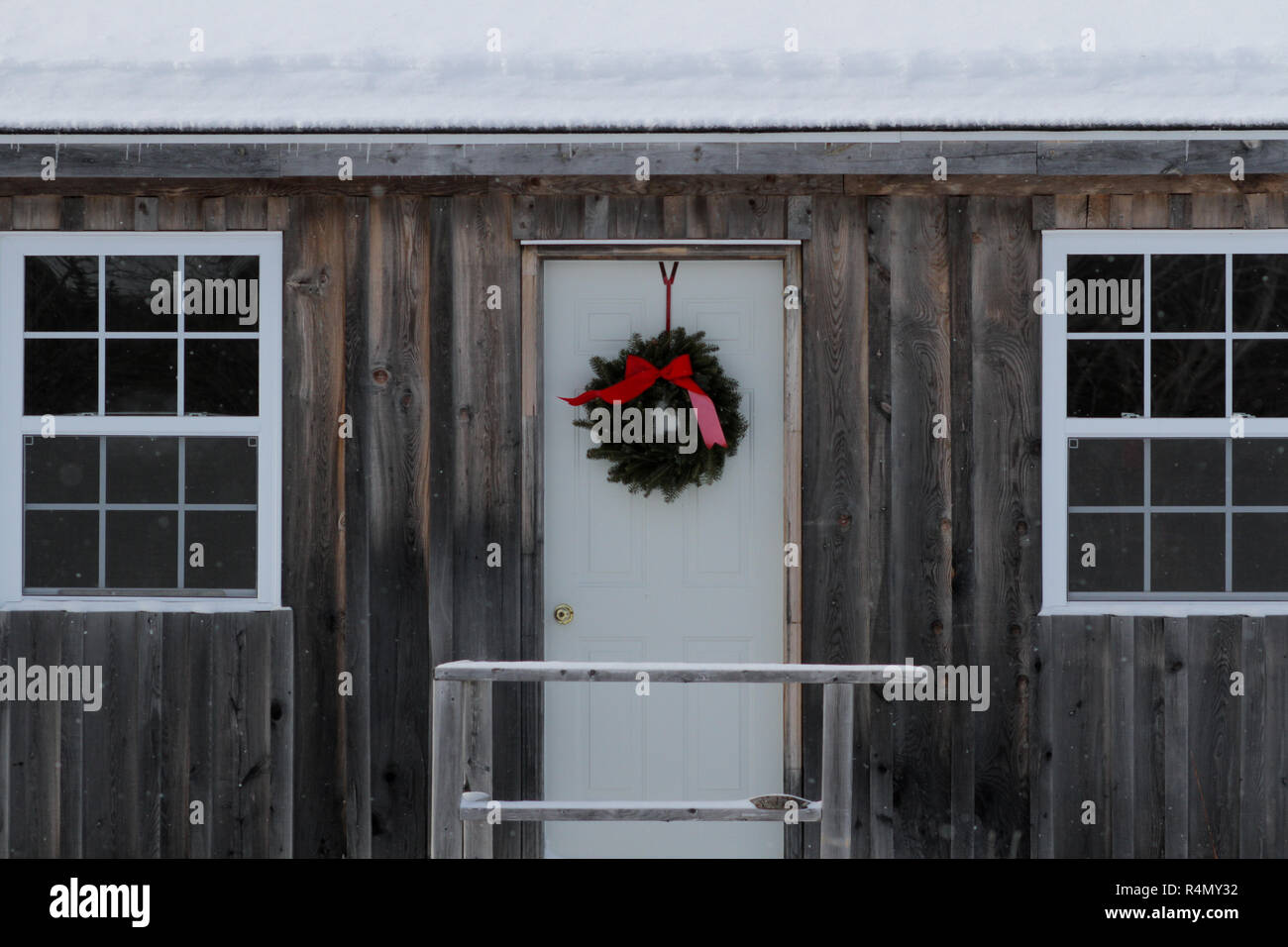 A small cabin in the woods of Cape Breton, Nova Scotia decorated for Christmas Stock Photo Alamy