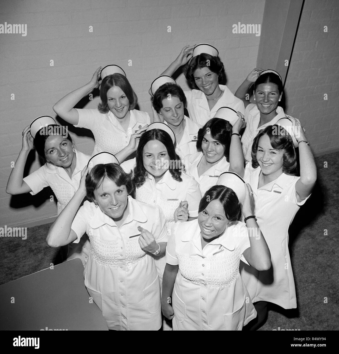 A group of newly graduated nurses gather together for a group shot in California, ca. 1976. Stock Photo