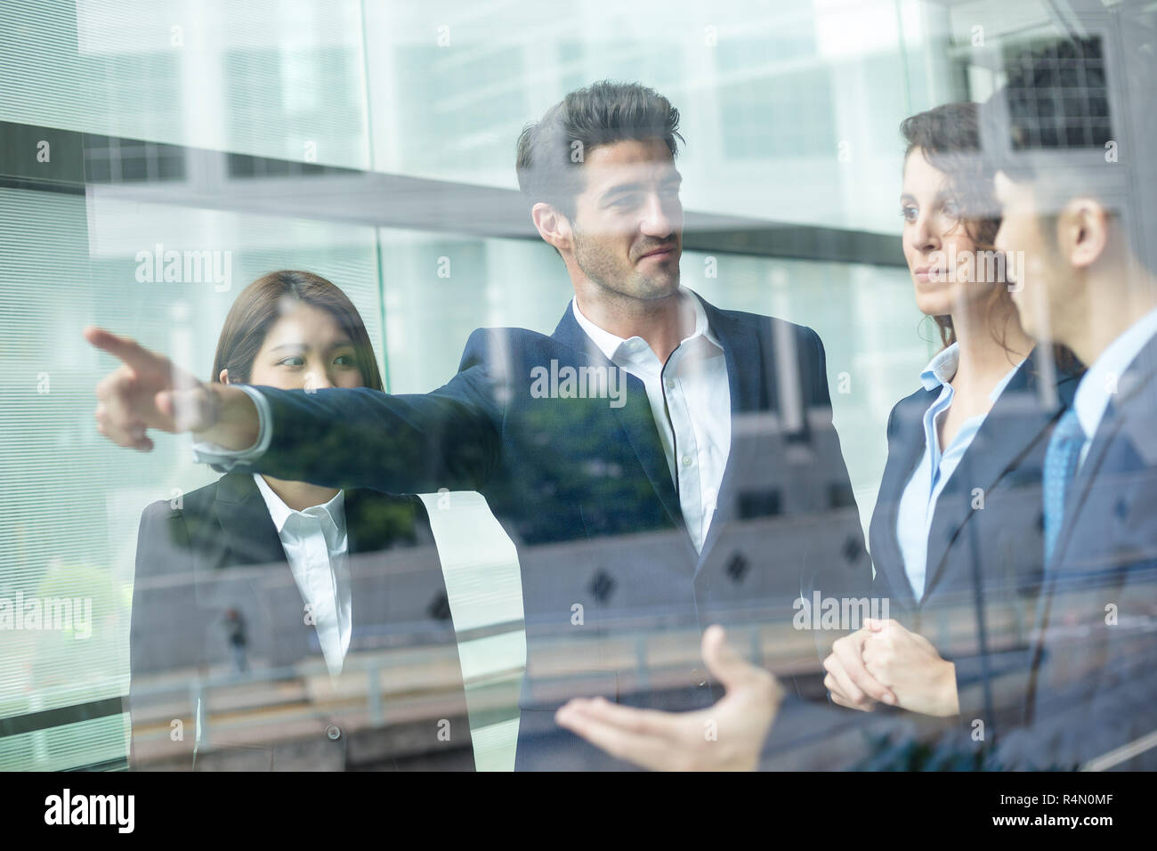 Group of Business people discuss inside office Stock Photo