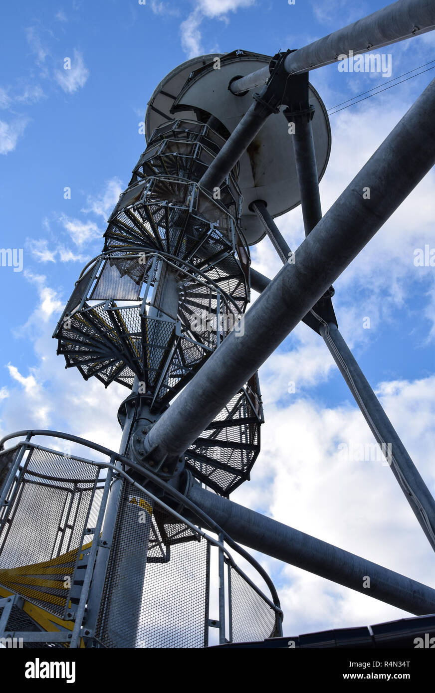 A Spiral staircase leading to the launching point of a death slide on Bournemouth Pier Stock Photo