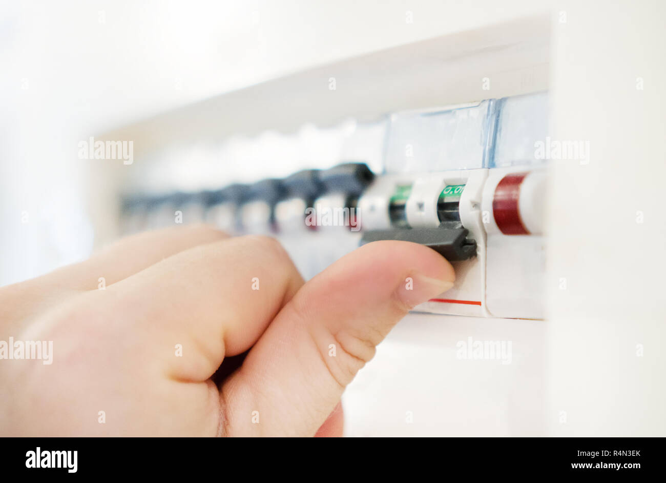 Male hand switching off fuse board Stock Photo Alamy