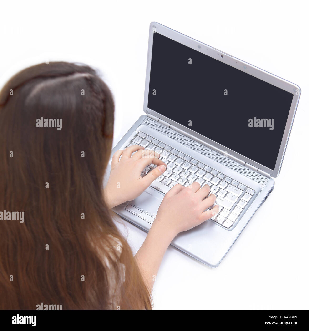 young modern girl with laptop lying on the floor Stock Photo - Alamy