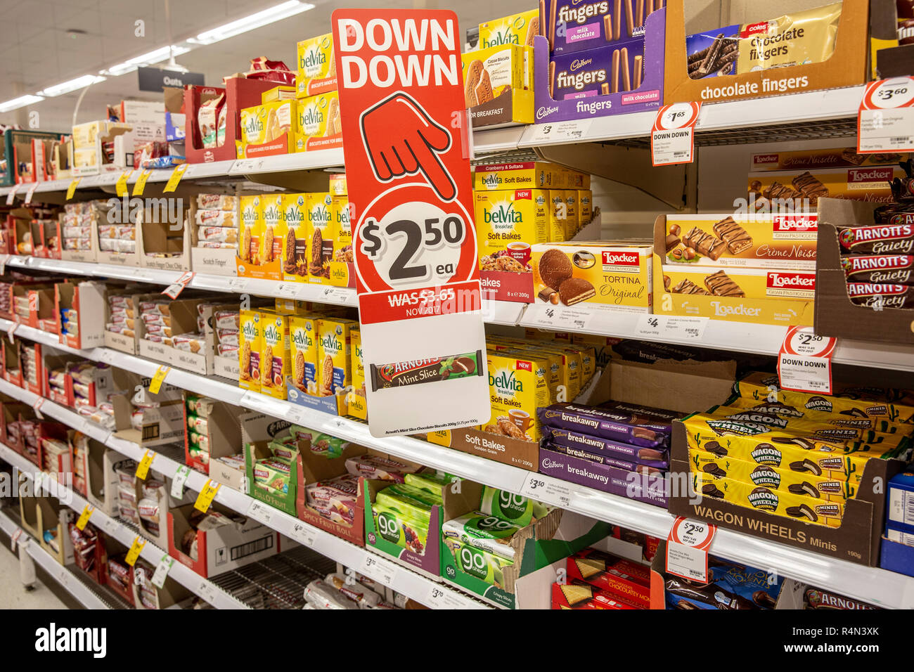 Coles supermarket in Australia, biscuits and snacks displayed for sale