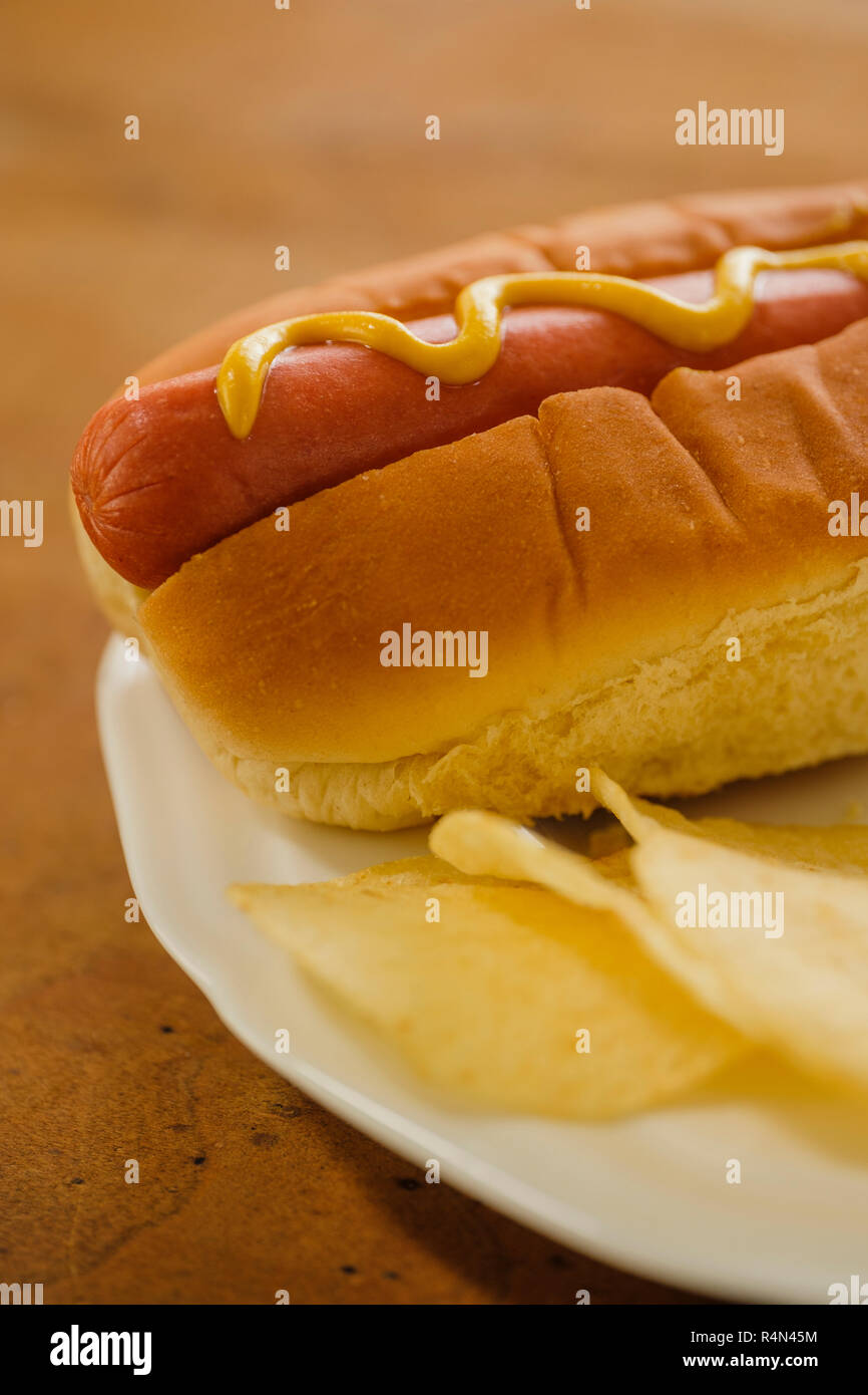 Hot dog and potato chips Stock Photo