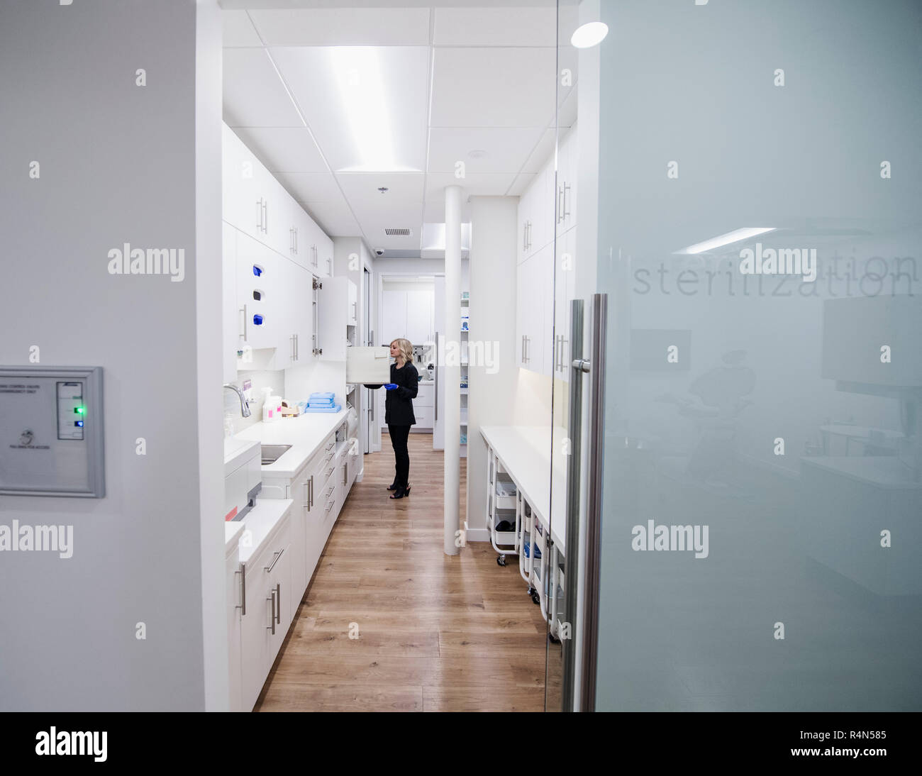 Dentist S Assistant Cleaning Equipment Stock Photo 226658549 Alamy
