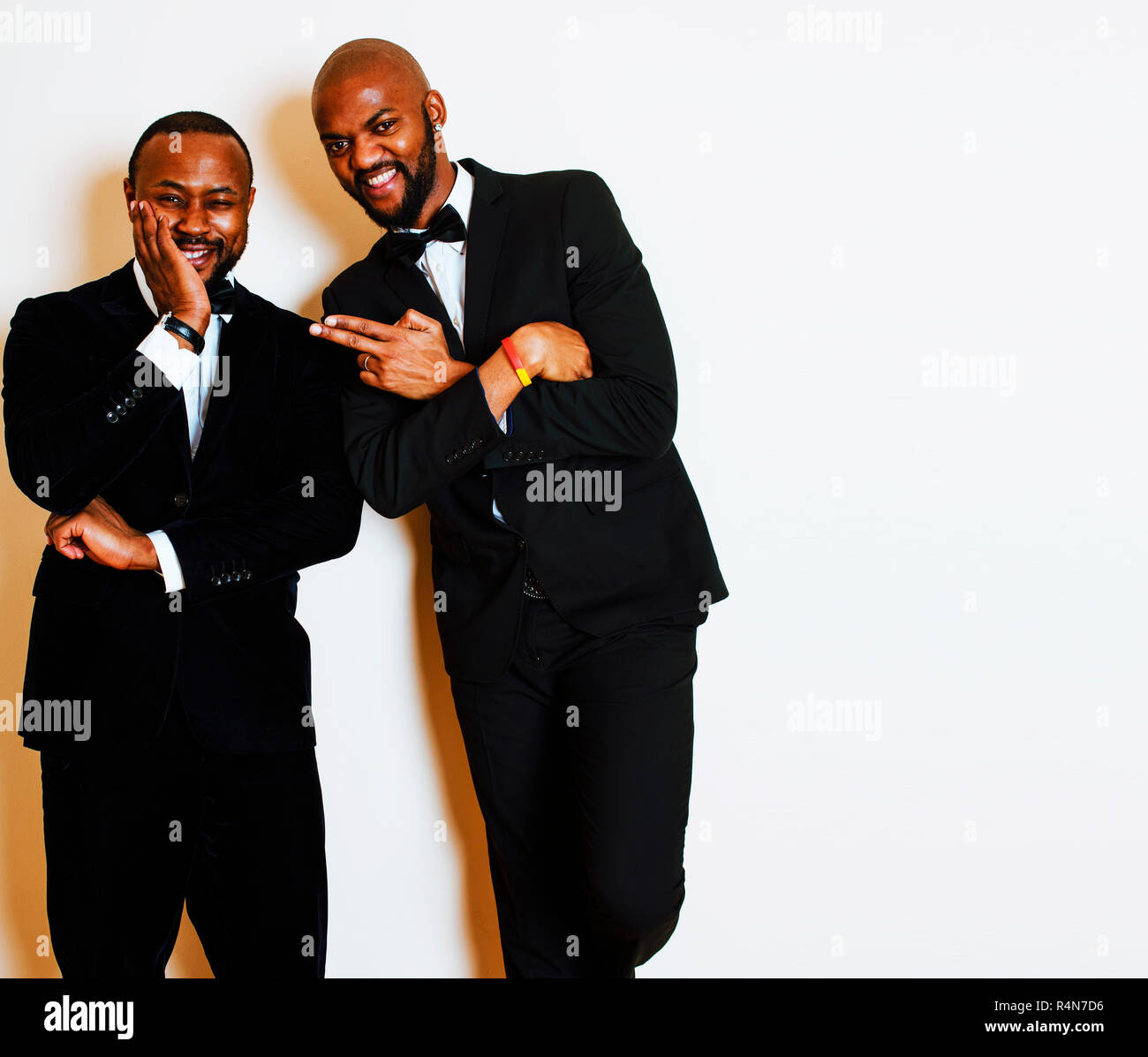 two afro-american businessmen in black suits emotional posing, g Stock ...