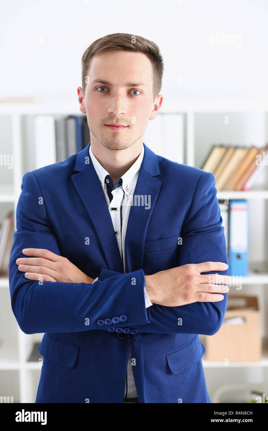 Handsome smiling man in suit and tie stand Stock Photo Alamy