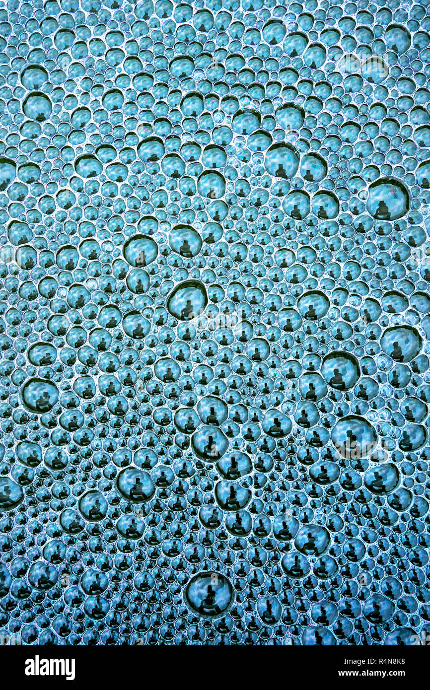 Cluster of bubbles made by a water fountain in an English garden pond Stock Photo Alamy