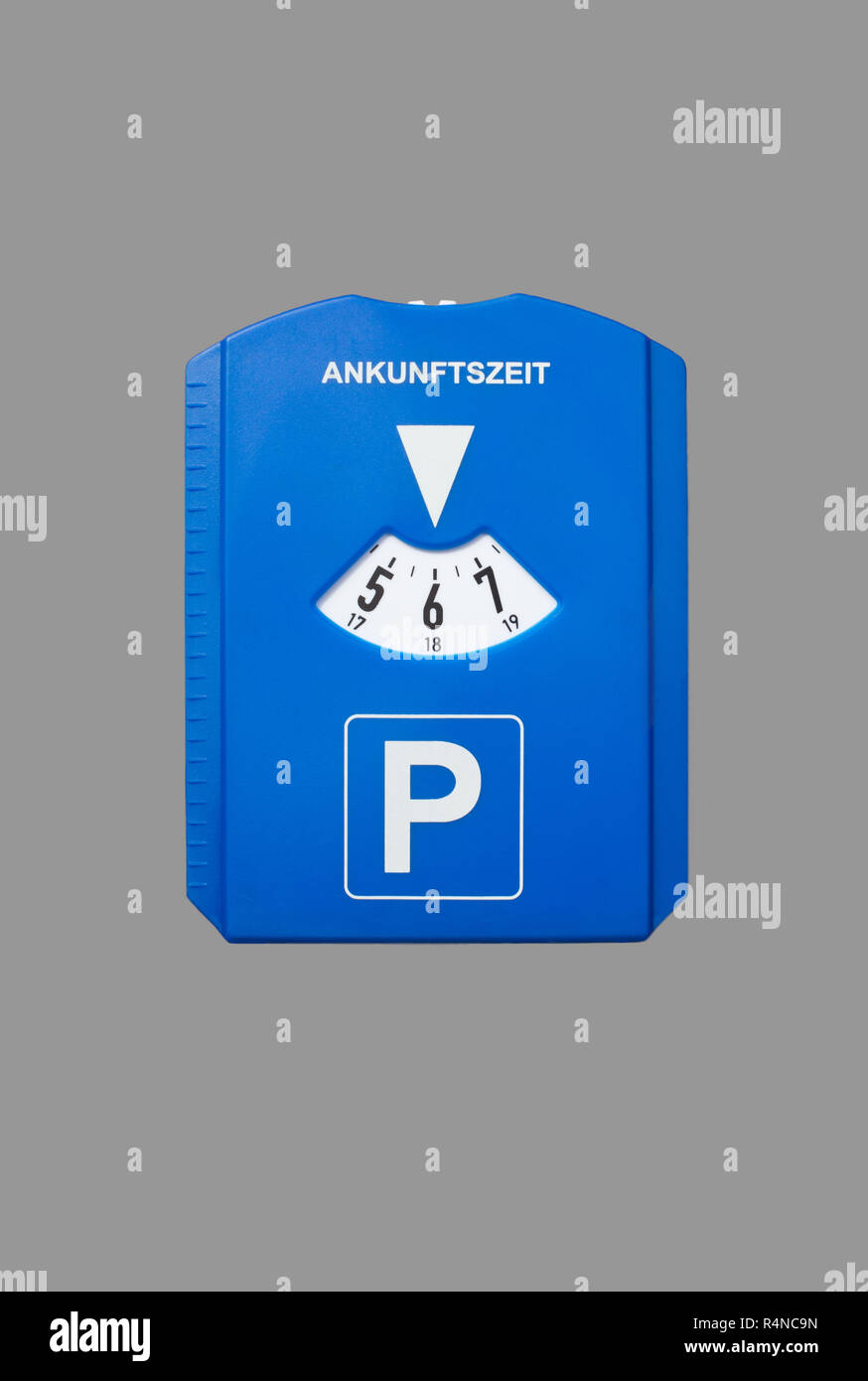 a parking disc isolated on gray Stock Photo - Alamy