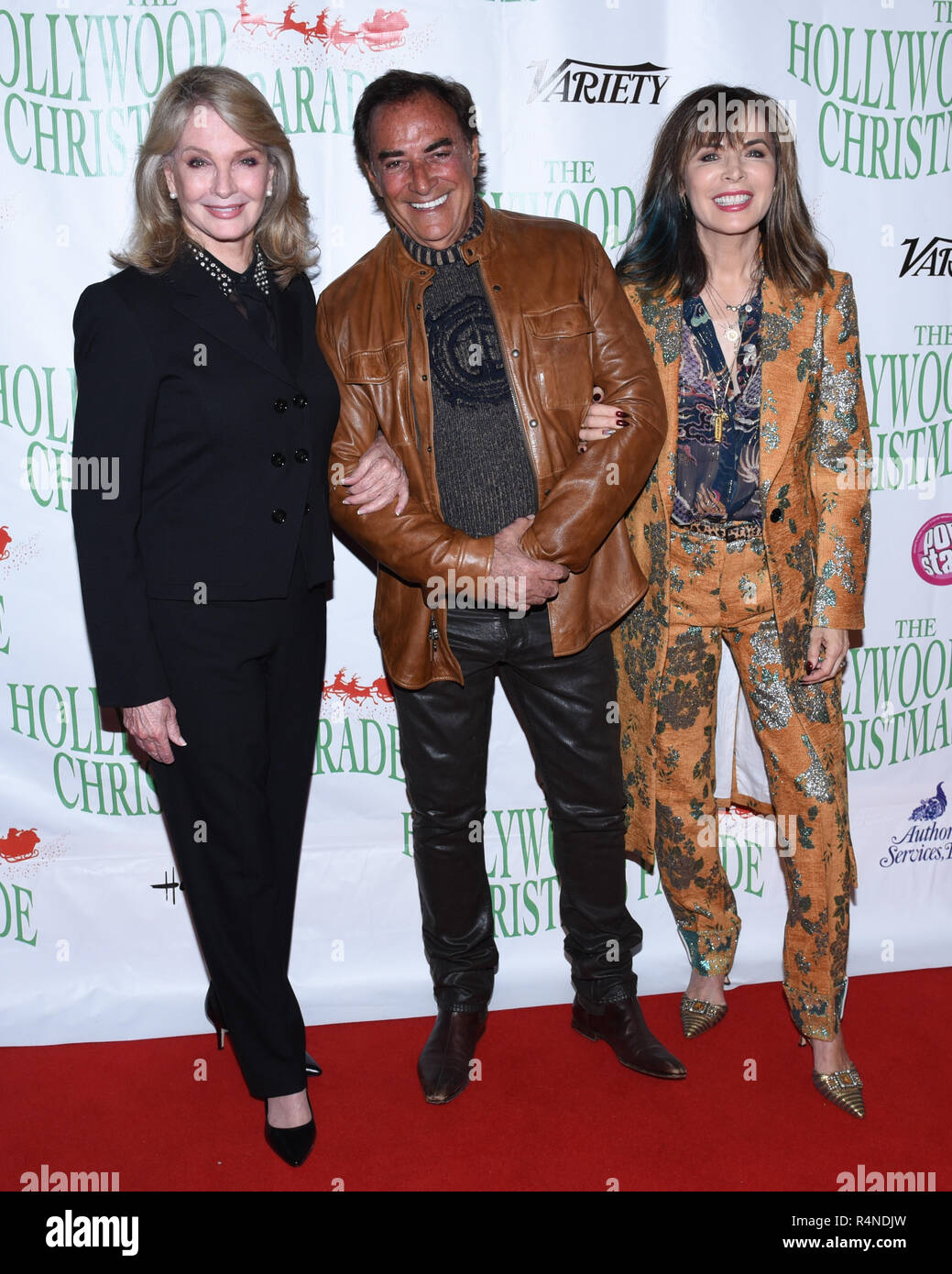 Deidre Hall, Thaao Penghlis and Lauren Koslow arrives at the 87th Annual Hollywood Christmas Parade in Hollywood California on November 25, 2018. Stock Photo