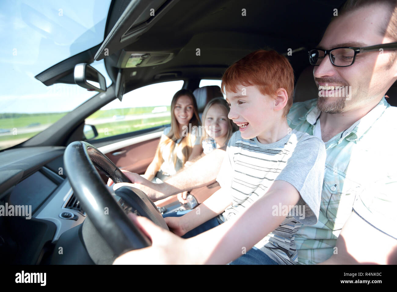 Mother teaching son to drive — 12