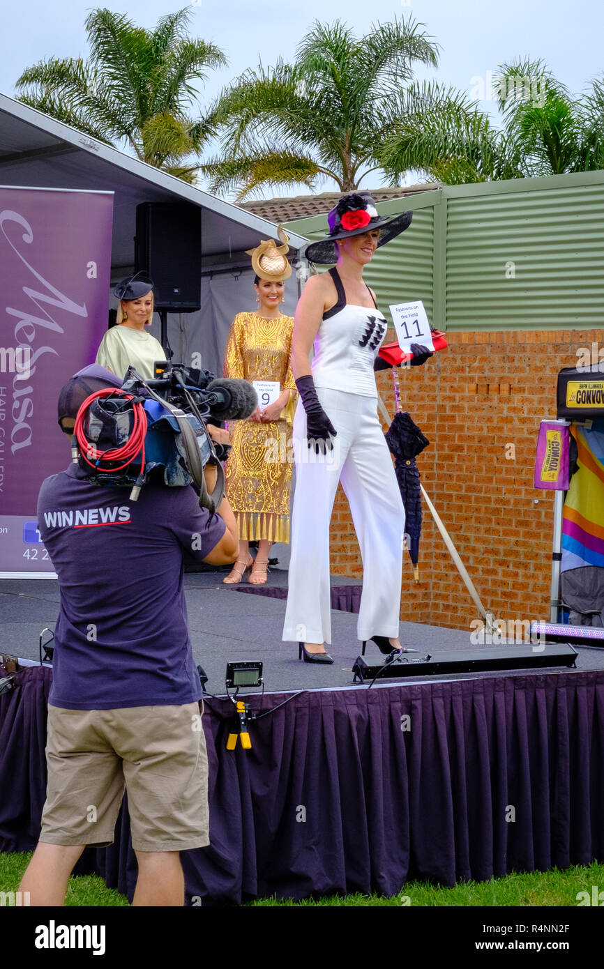 Fashionable ladies are filmed by local news TV company at Fashions in the  Field event at Australian race meeting, Kembla Grange, NSW, Australia Stock  Photo - Alamy
