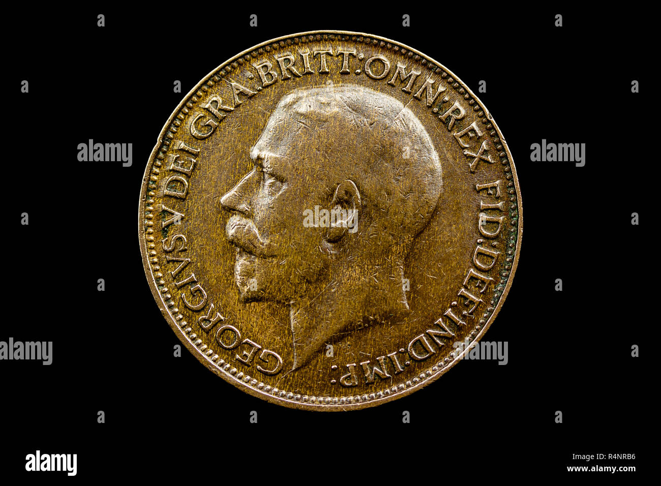 UK 1921 Farthing coin, showing head King George V and date 1921, with the surrounding legend: GEORGIVS V DEI GRA:BRITT:OMN:REX FID:DEF:IND:IMP: Stock Photo