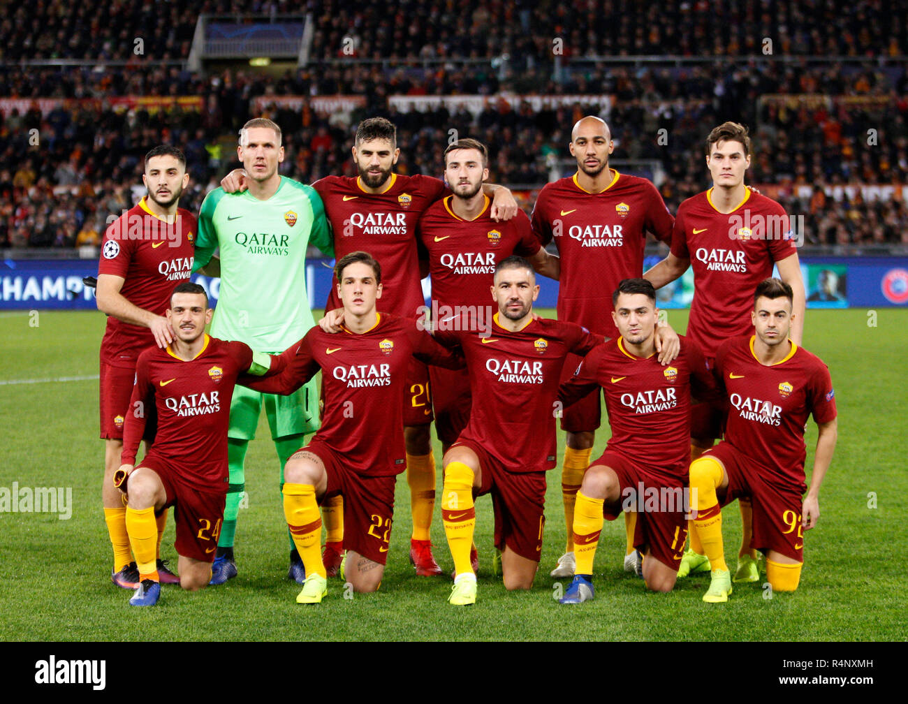 Rome, Italy, 27th November, 2018. Roma's players, front row, from left, Alessandro Florenzi , Nicolo' Zaniolo, Aleksandar Kolarov, Cengiz Under, Stephan El Shaarawy, back row, from left, Kostas Manolas, Robin Olsen, Federico Fazio, Bryan Cristante, Steven Nzonzi and Patrik Schick, pose prior to the start of the Champions League Group G soccer match between Roma and Real Madrid at the Olympic Stadium. Real Madrid won 2-0. © UPDATE IMAGES/ Alamy Live News Stock Photo