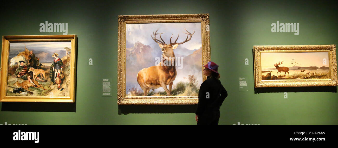 National Gallery. London, UK. 28 Nov 2018 - A woman looks at an oil-on-canvas painting of a red deer stag completed in 1851 by the English painter Sir Edwin Landseer'.     The Monarch of the Glen (about 1985) is one of the most famous British pictures of the nineteenth century; for many people it encapsulates the grandeur and majesty of ScotlandÕs highlands and wildlife.    Credit: Dinendra Haria/Alamy Live News Stock Photo