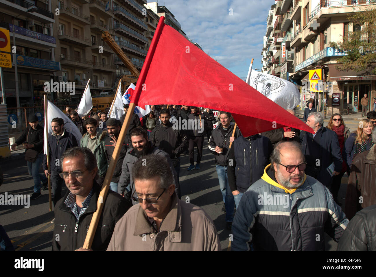 Thessaloniki, Greece, 28th November, 2018.  Protesters from the PAME trade union take part in a demonstration during a 24-hour walkout staged by Greece's largest private sector union GSEE  against planned pension cuts and to demand the reversal of labour reforms implemented under the country's third bailout. The strike by the GSEE union is the second major strike since Greece exited its bailout programm in August. Credit : Orhan Tsolak / Alamy Live News. Stock Photo