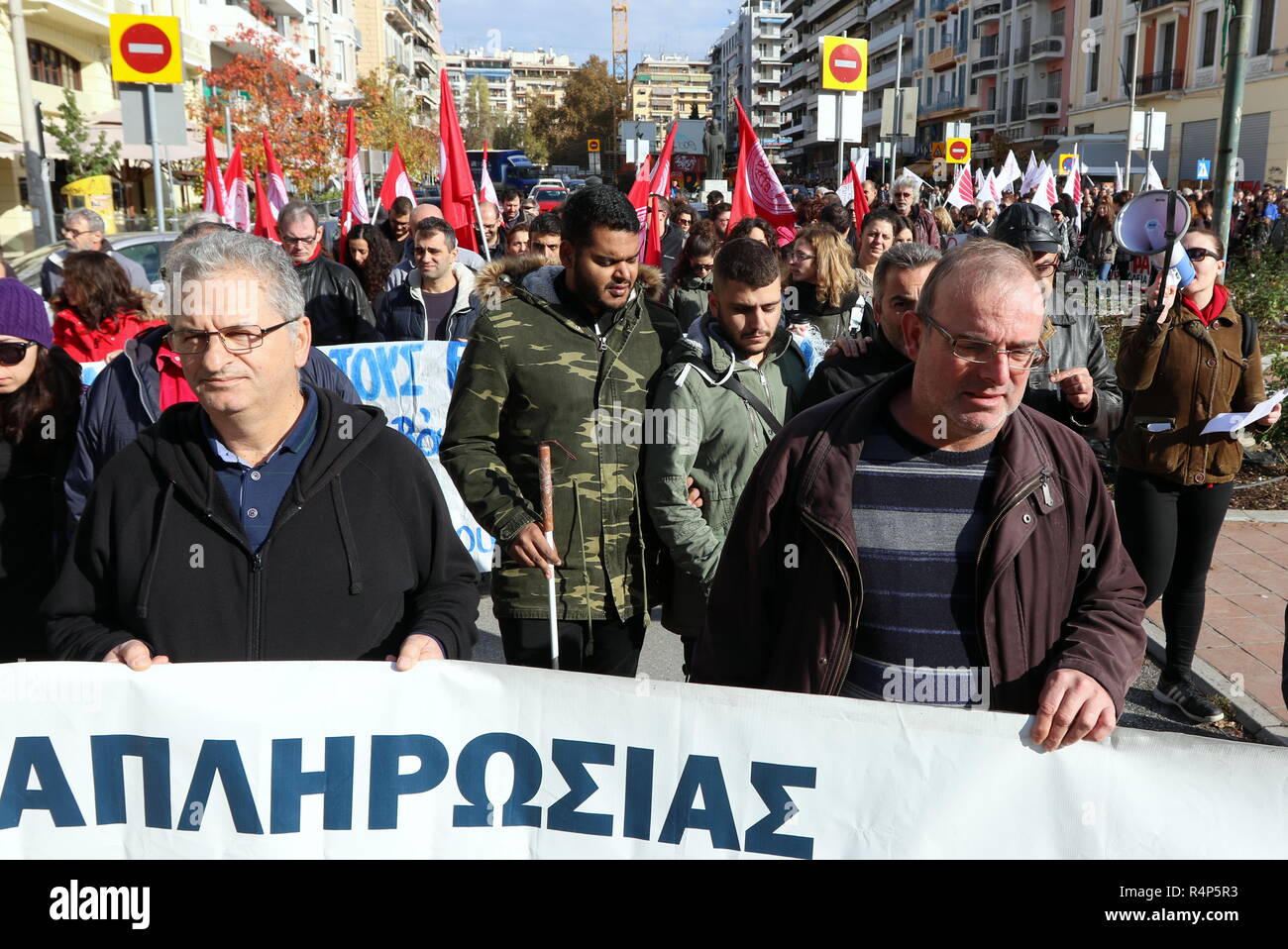 Thessaloniki, Greece, 28th November, 2018. Protesters from the communist-affiliated trade union PAME take part in a demonstration during a 24-hour walkout staged by Greece's largest private sector union GSEE  against planned pension cuts and to demand the reversal of labour reforms implemented under the country's third bailout. The strike by the GSEE union is the second major strike since Greece exited its bailout programme in August. Credit : Orhan Tsolak / Alamy Live News. Stock Photo