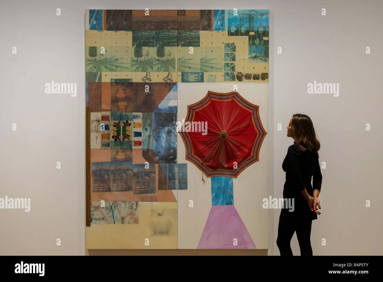 Galerie Thaddaeus Ropac. Mayfair, London. UK. 28 Nov 2018. A woman views 'Lipstick (Spread)', 1981 - Mixed media on two attached panels. Preview of first UK exhibition dedicated to Monumental Series of Robert Rauschenberg Spreads dedicated to the American artist's Spreads series at Galerie Thaddaeus Ropac in Mayfair. Robert Rauschenberg will be on display from 28 November to 26 January 2019.   Credit: Dinendra Haria/Alamy Live News Stock Photo