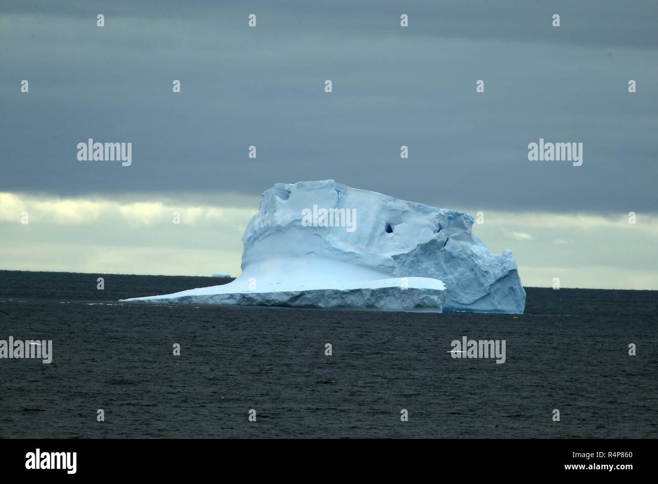 (181128) -- ABOARD XUELONG, Nov. 28, 2018 (Xinhua) -- Photo taken on Nov. 27, 2018 shows iceberg seen from China's research icebreaker Xuelong in a floating ice area in Southern Ocean. China's research icebreaker Xuelong has entered a floating ice area in the Southern Ocean to avoid a cyclone. It is scheduled to reach the Zhongshan Station in Antarctica on Nov. 30. Also known as the Snow Dragon, the icebreaker carrying a research team set sail from Shanghai on Nov. 2, beginning the country's 35th Antarctic expedition which will last 162 days and cover 37,000 nautical miles (68,500 km). (Xinhua Stock Photo