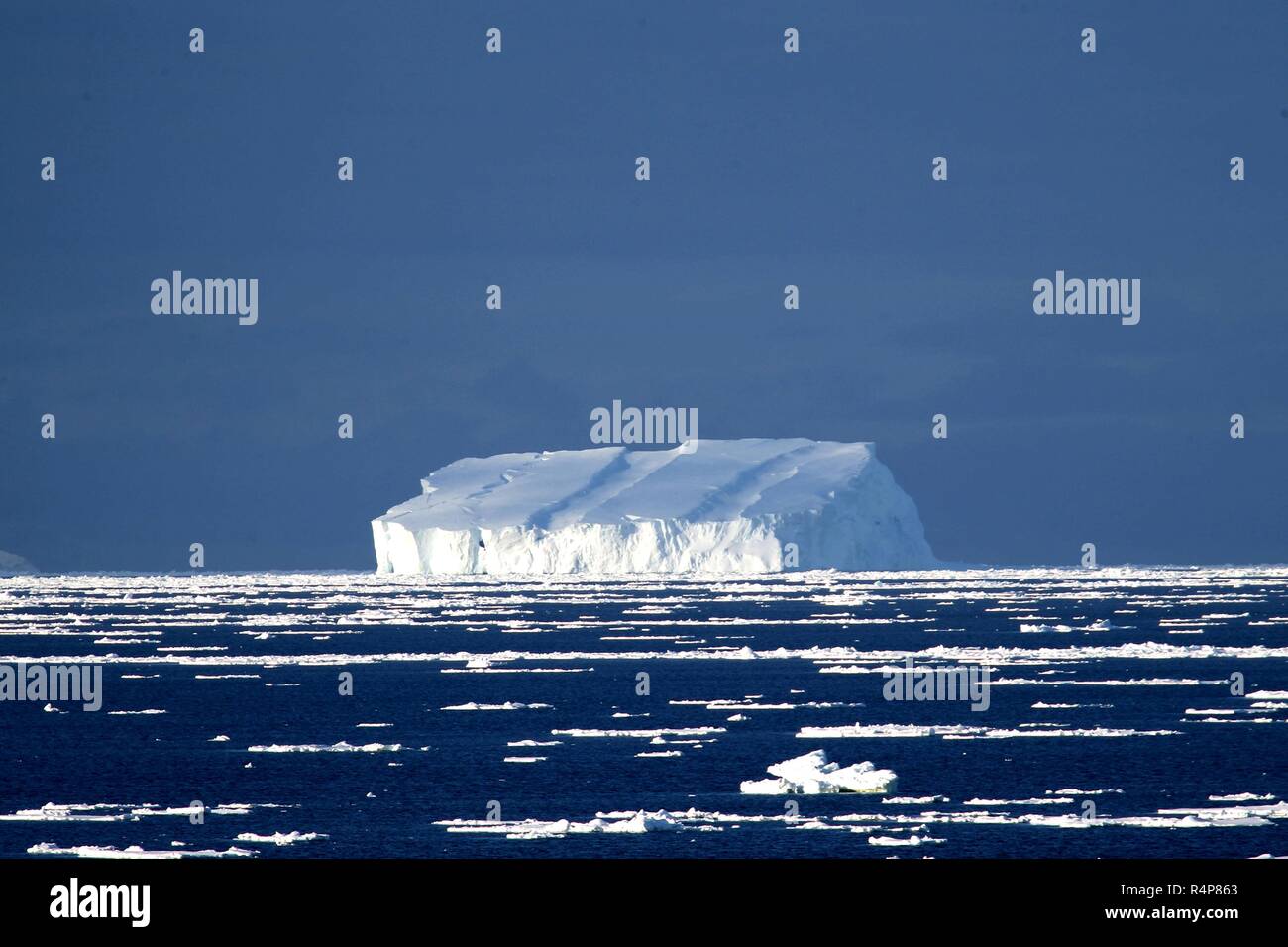 (181128) -- ABOARD XUELONG, Nov. 28, 2018 (Xinhua) -- Photo taken on Nov. 25, 2018 shows iceberg seen from China's research icebreaker Xuelong in a floating ice area in Southern Ocean. China's research icebreaker Xuelong has entered a floating ice area in the Southern Ocean to avoid a cyclone. It is scheduled to reach the Zhongshan Station in Antarctica on Nov. 30. Also known as the Snow Dragon, the icebreaker carrying a research team set sail from Shanghai on Nov. 2, beginning the country's 35th Antarctic expedition which will last 162 days and cover 37,000 nautical miles (68,500 km). (Xinhua Stock Photo