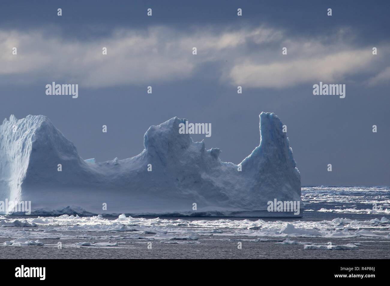(181128) -- ABOARD XUELONG, Nov. 28, 2018 (Xinhua) -- Photo taken on Nov. 27, 2018 shows iceberg seen from China's research icebreaker Xuelong in a floating ice area in Southern Ocean. China's research icebreaker Xuelong has entered a floating ice area in the Southern Ocean to avoid a cyclone. It is scheduled to reach the Zhongshan Station in Antarctica on Nov. 30. Also known as the Snow Dragon, the icebreaker carrying a research team set sail from Shanghai on Nov. 2, beginning the country's 35th Antarctic expedition which will last 162 days and cover 37,000 nautical miles (68,500 km). (Xinhua Stock Photo