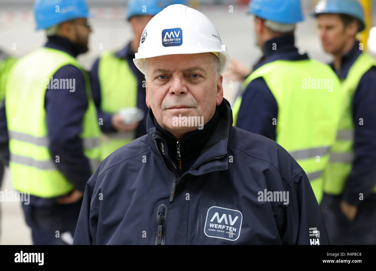 Rostock, Germany. 28th Nov, 2018. Harald Ruschel, Chairman of the Works Council at the Warnemünde site of MV Werften, is following the ceremonial commissioning of a new laser hybrid panel line, one of the most modern welding systems in Europe. Credit: Bernd Wüstneck/dpa/Alamy Live News Stock Photo