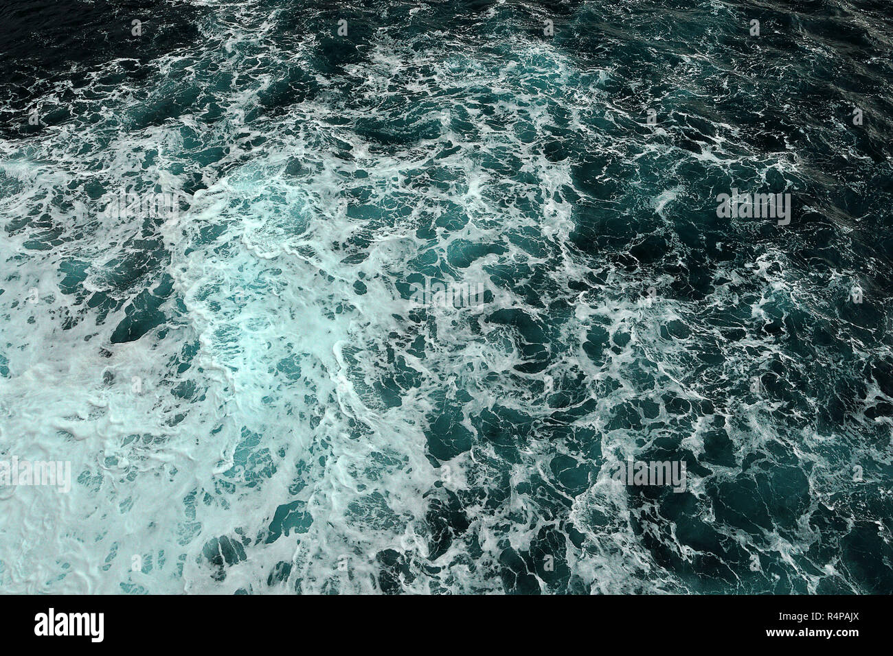 splashy blue sea water surface, natural texture Stock Photo