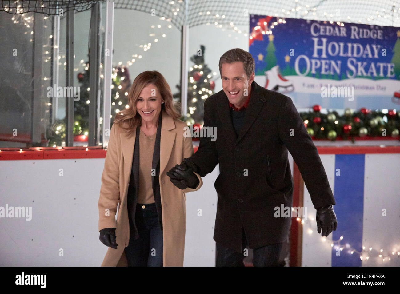 REUNITED AT CHRISTMAS, from left: Nikki DeLoach, Mike Faiola, (aired Nov. 21, 2014). photo: Bettina Strauss / ©Hallmark Channel / Courtesy: Everett Collection Stock Photo