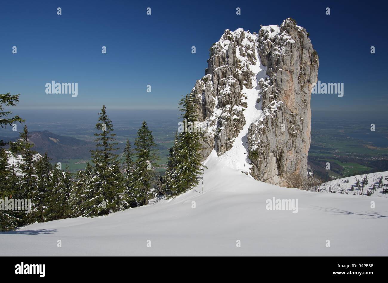 kampenwand,view from the snowy hiking trail on the rock tower,chiemgau,upper bavaria,southern germany Stock Photo
