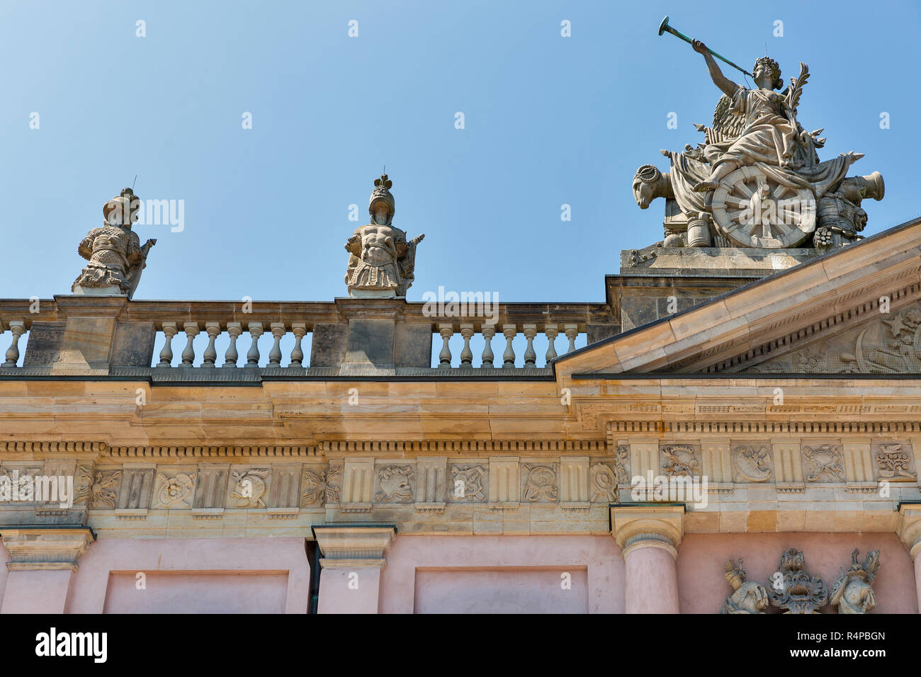 Zeughaus or Old Arsenal roof sculpture. Now it is German Historical Museum in Berlin, Germany. Stock Photo