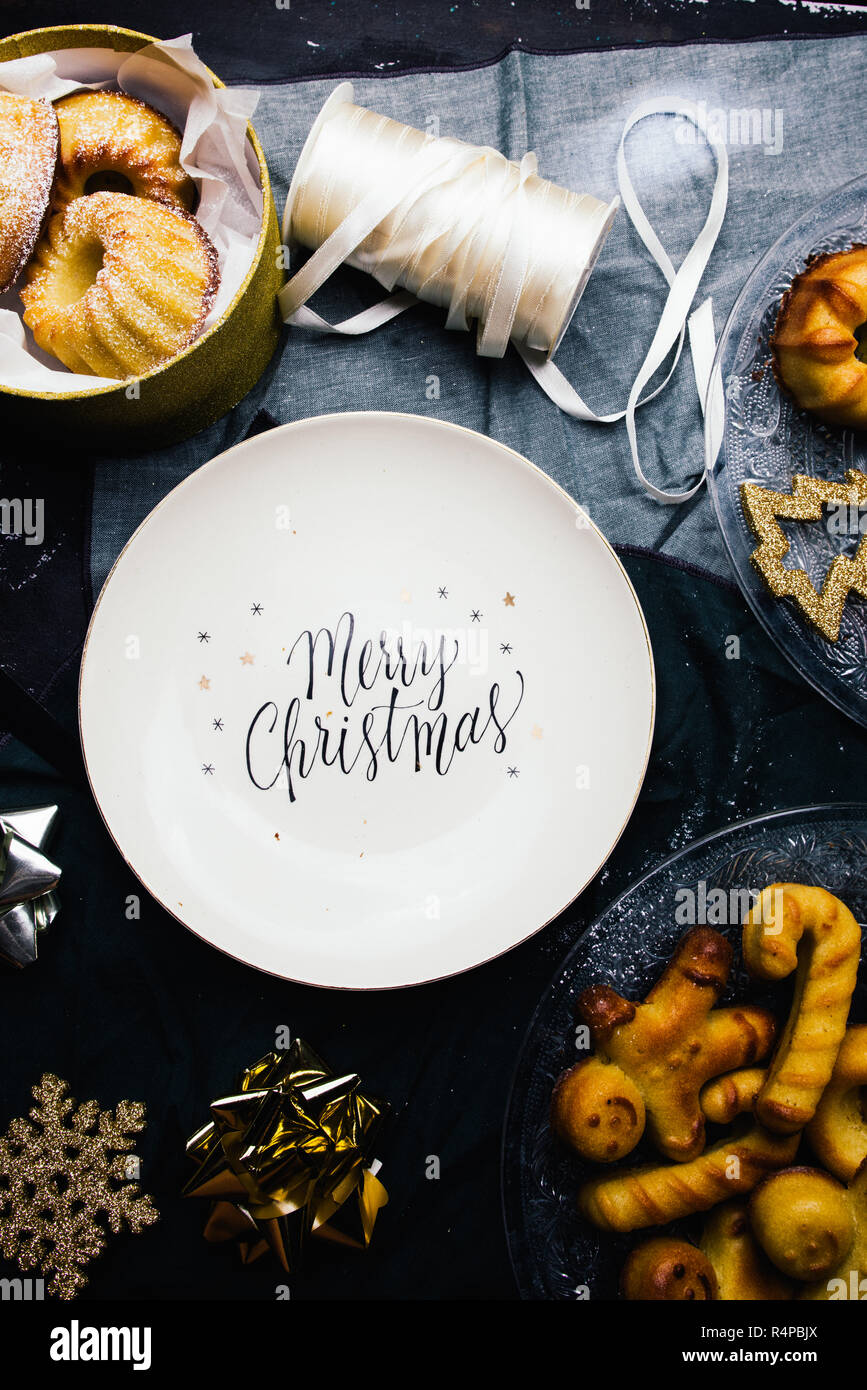 Christmas Plate With Greetings Printed Circled By Mini Bundt Cake