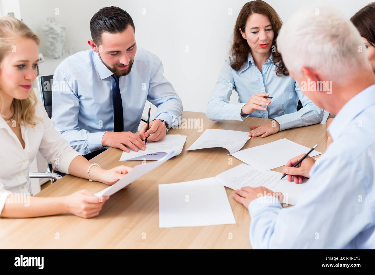 Lawyers having team meeting in law firm Stock Photo Alamy