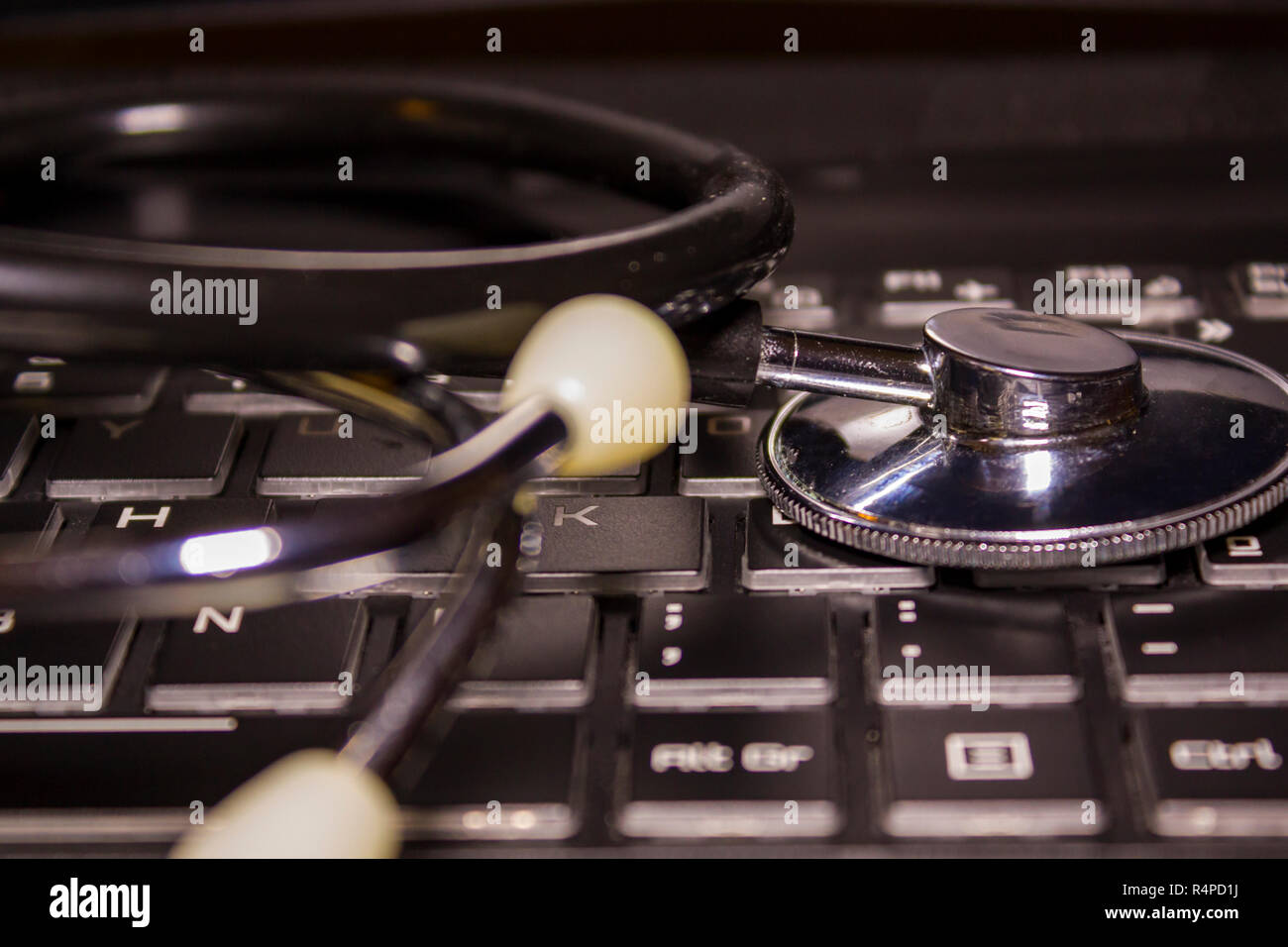 Medical Stethoscope over computer keyboard Stock Photo - Alamy