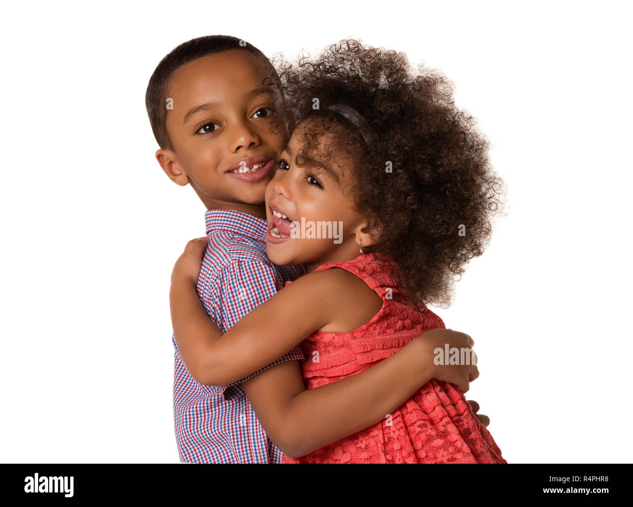 Two cheerful africanamerican siblings brother and sister hugging each