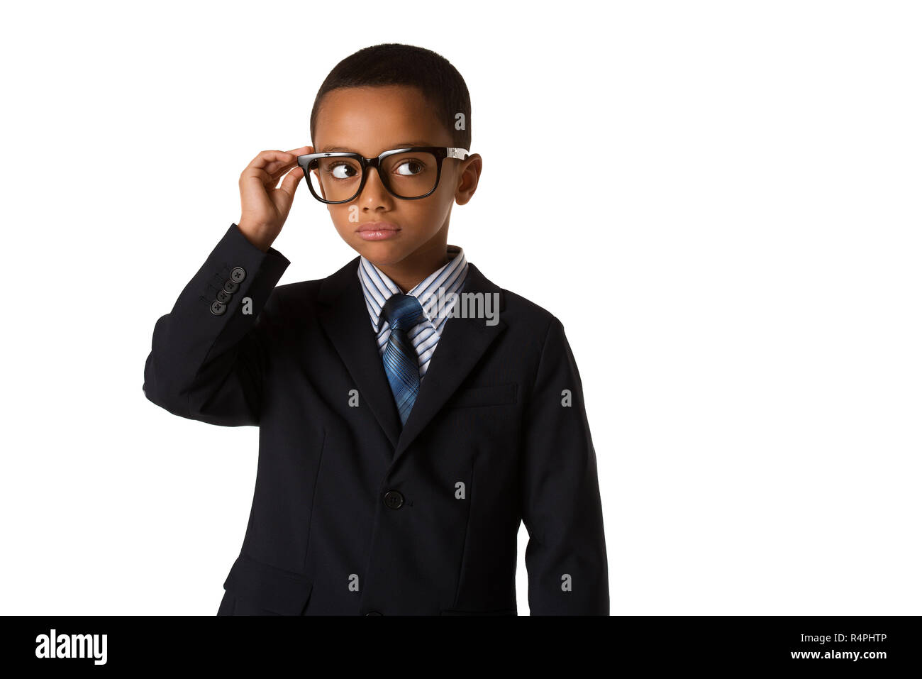 Elegant little man with glasses in business suit. Concept of leadership and  success. Studio shot. Young boy posing Stock Photo - Alamy