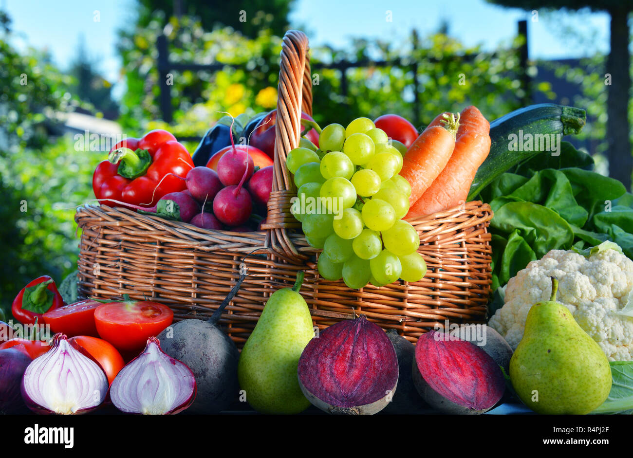 Fresh organic vegetables and fruits in the garden Stock Photo - Alamy