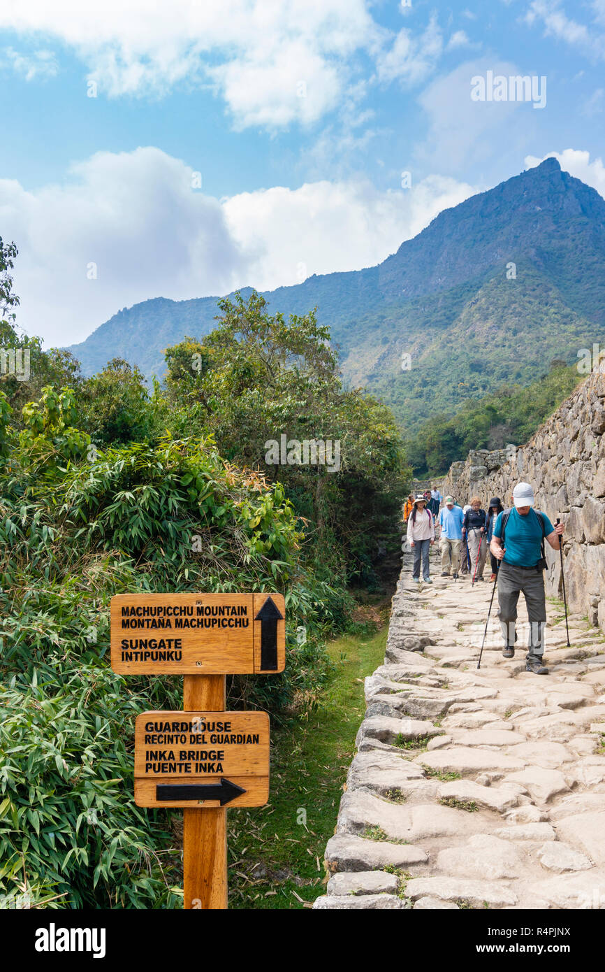 Tourist coming back from a hike to Machu Picchu Mountain Stock Photo