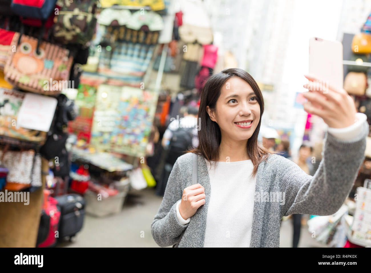 Woman travel in Hong Kong and taking selfie Stock Photo - Alamy