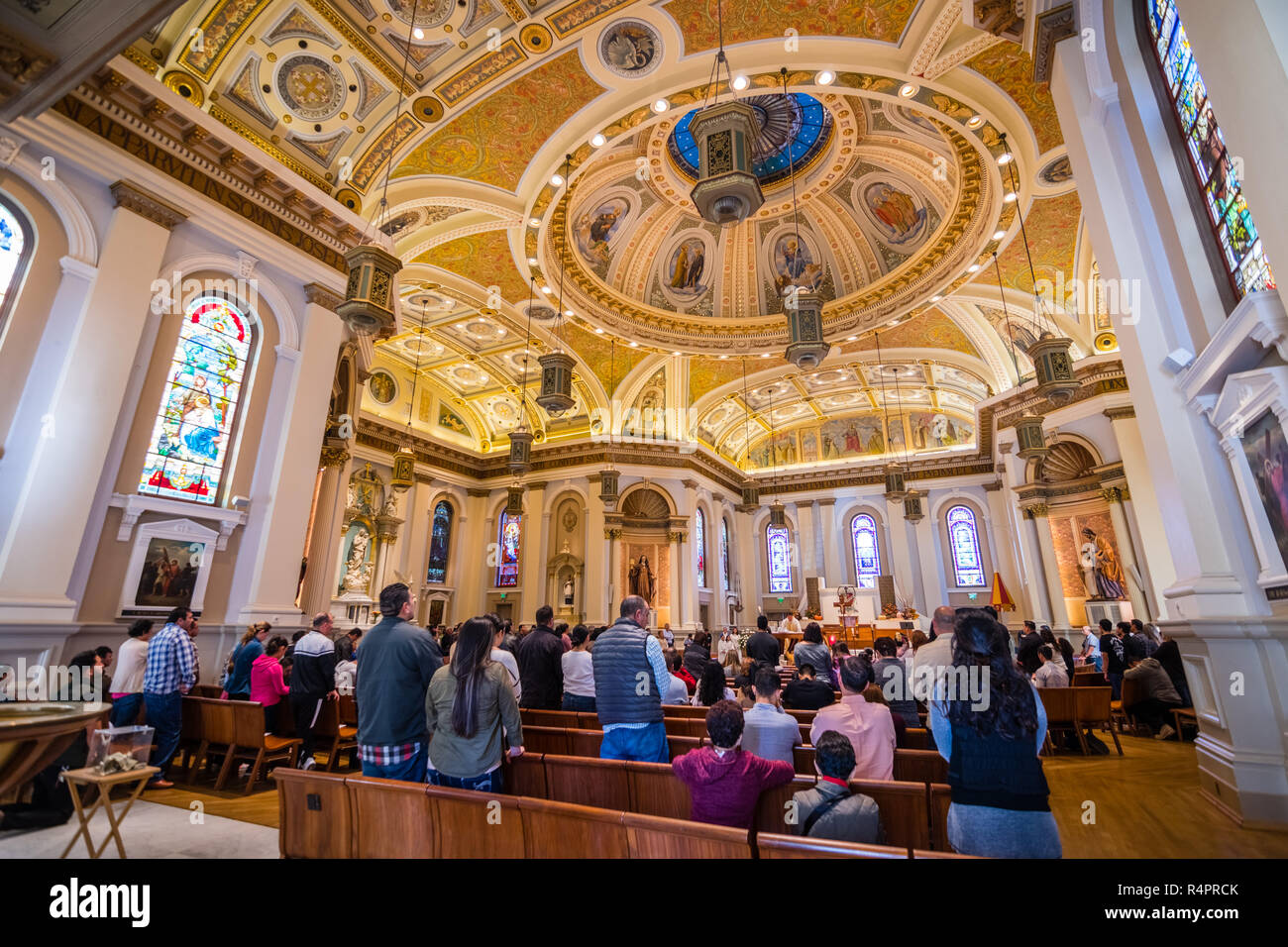 November 25, 2018 San Jose / CA / USA -  People attending mass at the Cathedral Basilica of St. Joseph, a large Roman Catholic church located in downt Stock Photo