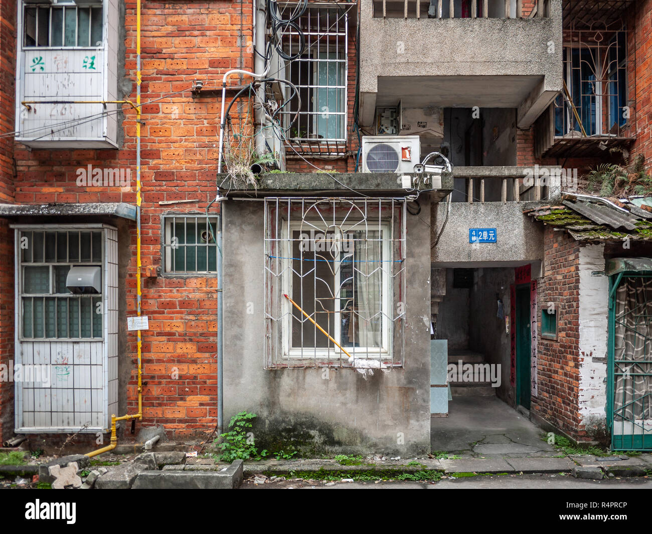Old and shabby residential apartment buildings. City of Liuzhou, Guangxi, China. Stock Photo