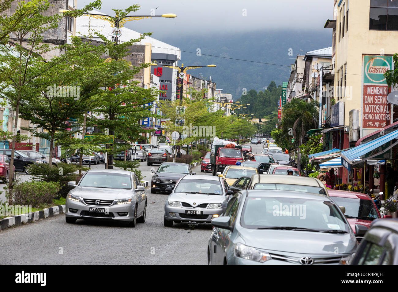 Street Scene with Local Traffic, Taiping, Malaysia. Stock Photo